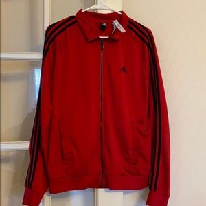 Adidas red lightweight men’s jacket size medium.
